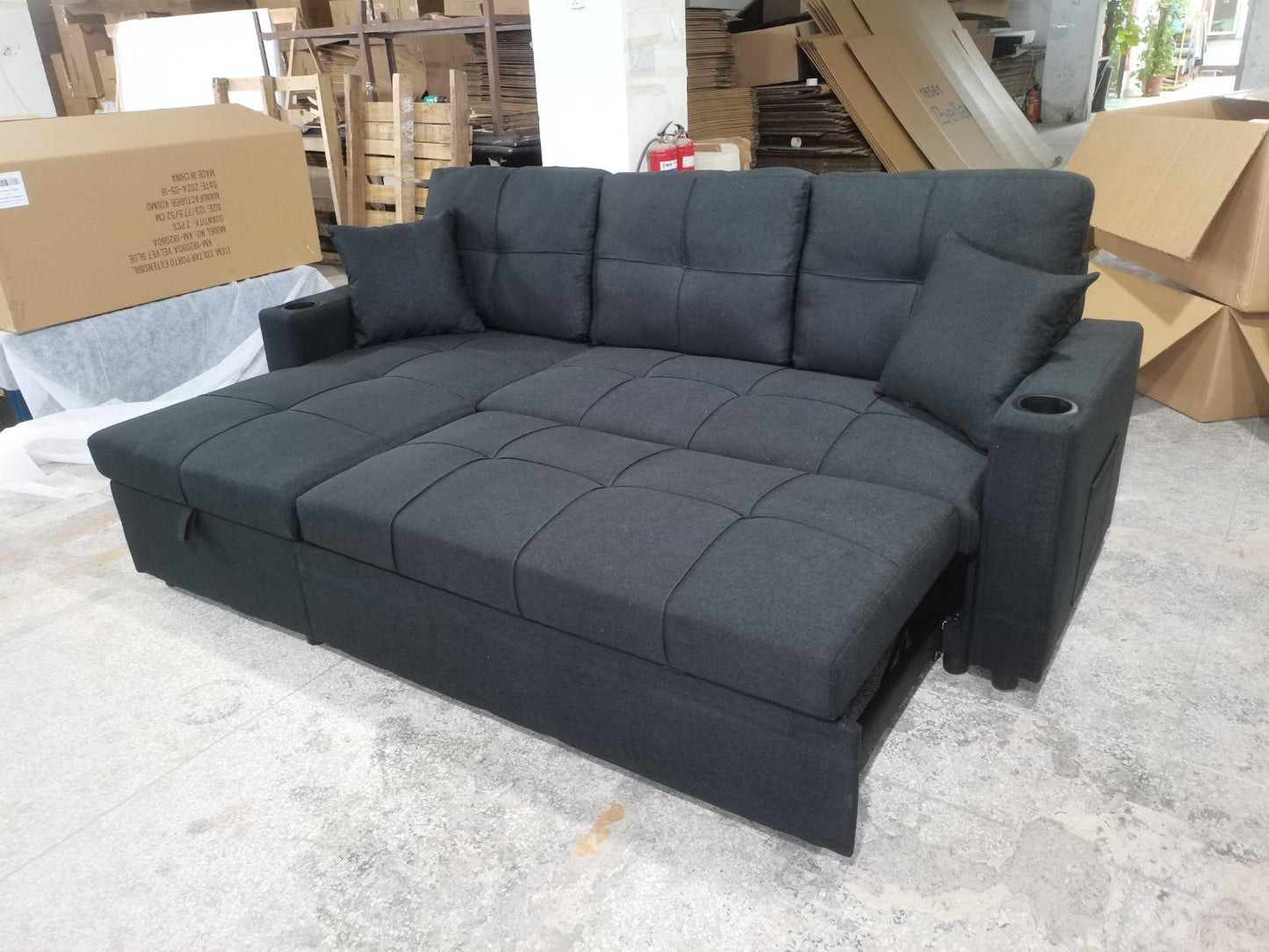 Full view of the 85-inch Fabric Reversible Sectional Sofa, showcasing the compact size, reversible configuration, and pull-out sleeper function.
