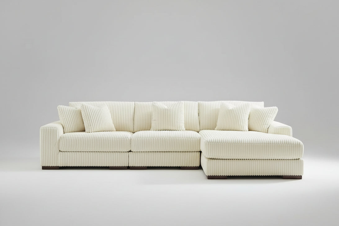 Full view of the Albany Ivory Corduroy Sectional Sofa, showcasing the ribbed texture and the fixed Right-Hand Facing (RHF) chaise.