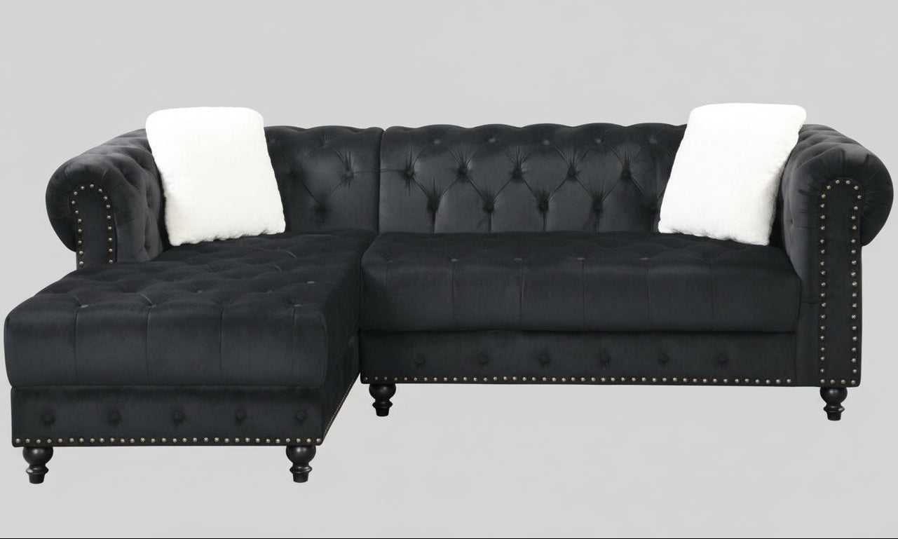 Full view of the Black Velvet Reversible Sectional Sofa, showcasing the plush fabric, L-shape design, and the elegant diamond tufting on the back cushions.