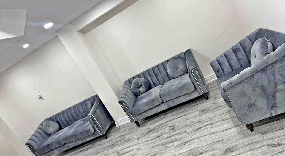 Close-up detail of the plush Dark Grey Velvet fabric upholstery, emphasizing the rich color and soft texture.