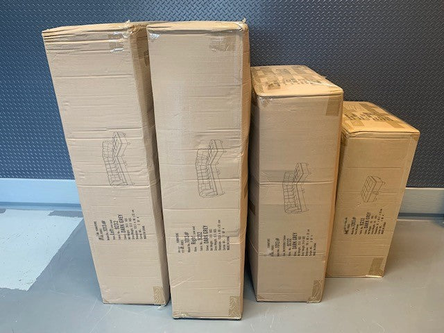 Close-up detail of the durable Grey Fabric and the storage ottoman lid lifted, highlighting the spacious internal storage capacity for throws or accessories.