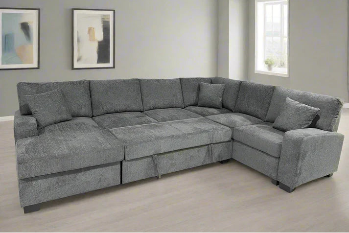 Full view of the Harlow Dark Grey Sofa Bed Sectional with the sleeping mechanism fully extended, showcasing the comfortable full-size sleeper area.