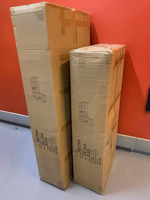 Close-up of the Left Chaise cushion lifted, clearly revealing the large, internal storage compartment within the Black PU Leather base.