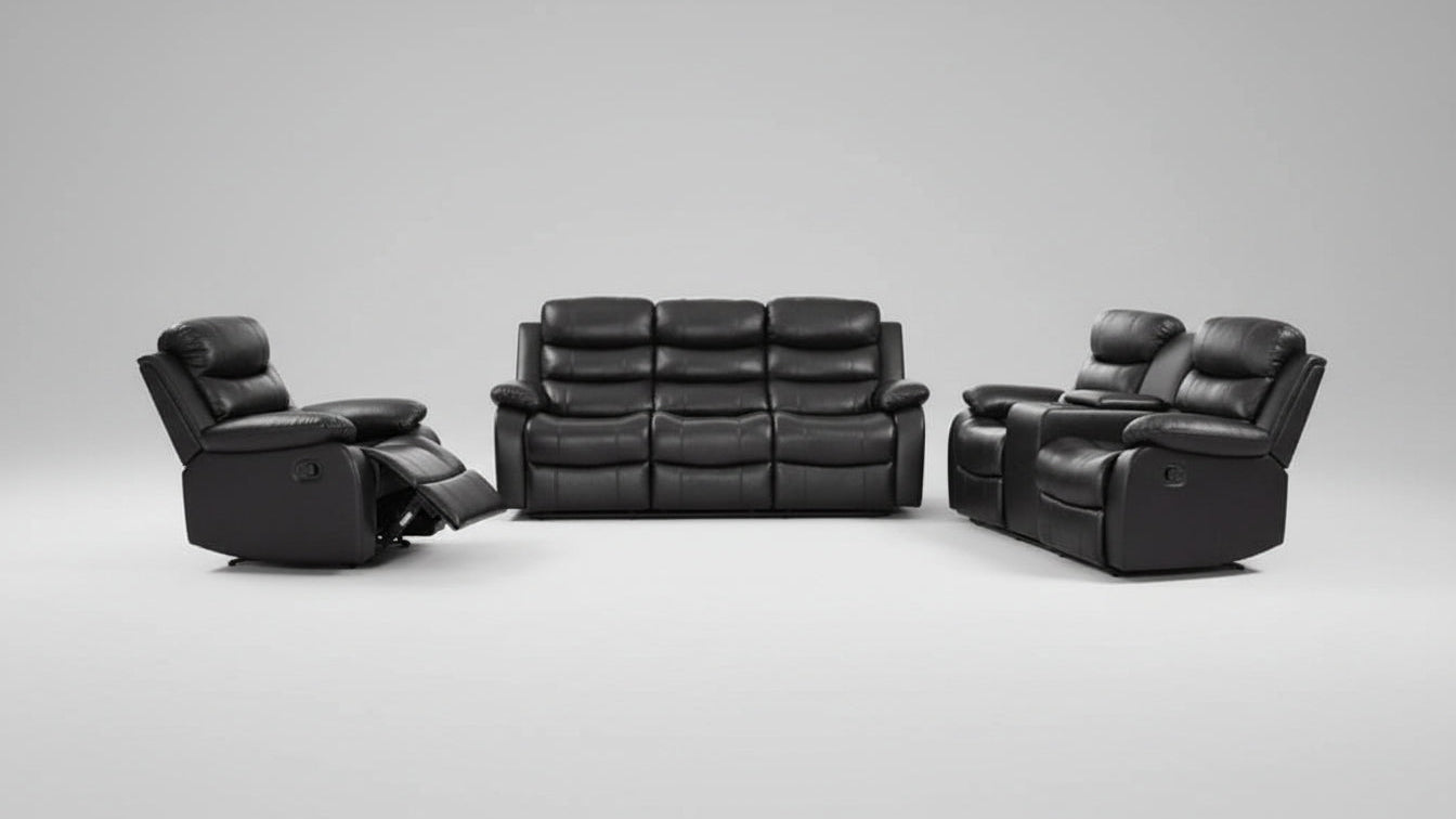 Full view of the Monoco Black Leather Manual Recliner 3-Piece Set, showing the sofa, loveseat, and chair arranged together in a living room.