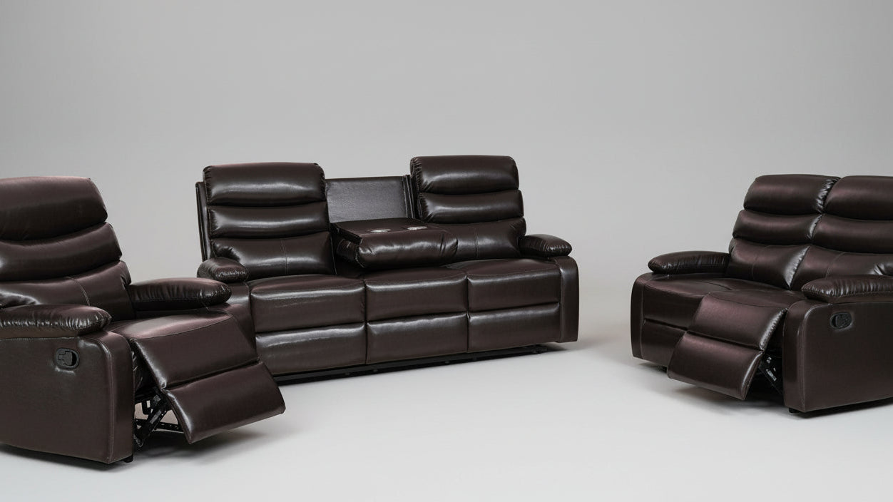 Full view of the Oliver Brown SLC Leather Manual Recliner 3-Piece Set, showing the sofa, loveseat, and chair with one piece in the reclined position.