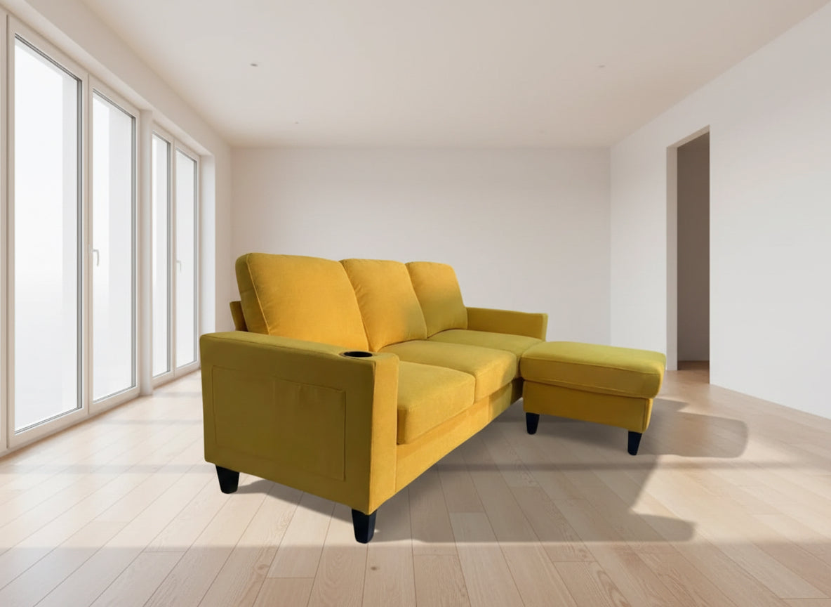 Full view of the Reversible Yellow Microfabric Sectional Sofa, showcasing the bright color, soft upholstery, and the L-shape configuration with center cupholders.