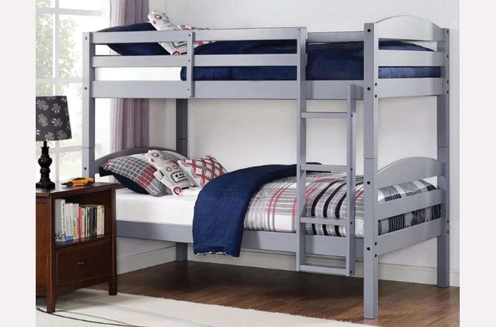 The single over single bunk bed separated into two individual twin beds, demonstrating the splittable and convertible design feature.