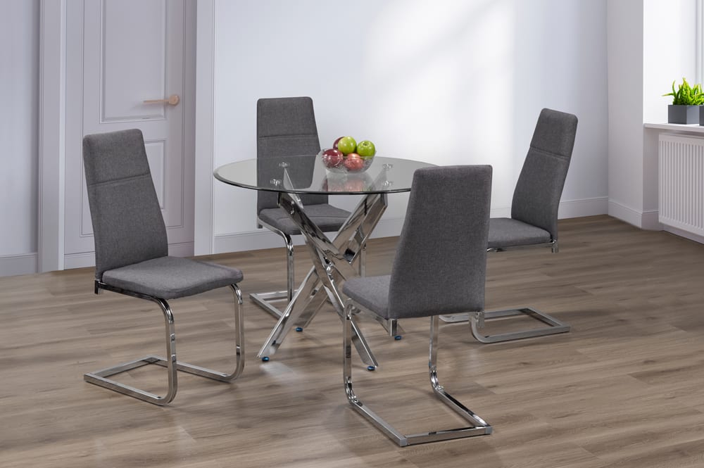 Full view of the compact 39-inch Round Tempered Glass Dining Set, showcasing the table and four chairs with reflective chrome legs.