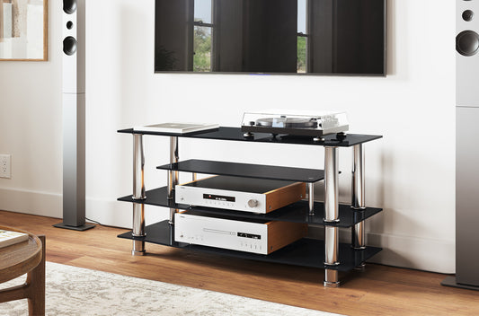 Full view of the compact 41-inch Black Glass TV Stand, showcasing the tiered black glass shelves and the reflective chrome support legs.