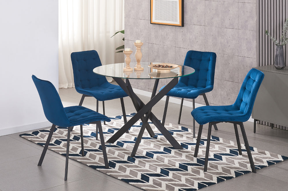 Full view of the 5-Piece Round Tempered Glass Dining Set, showcasing the clear glass table top, modern base, and four elegant velvet upholstered dining chairs.