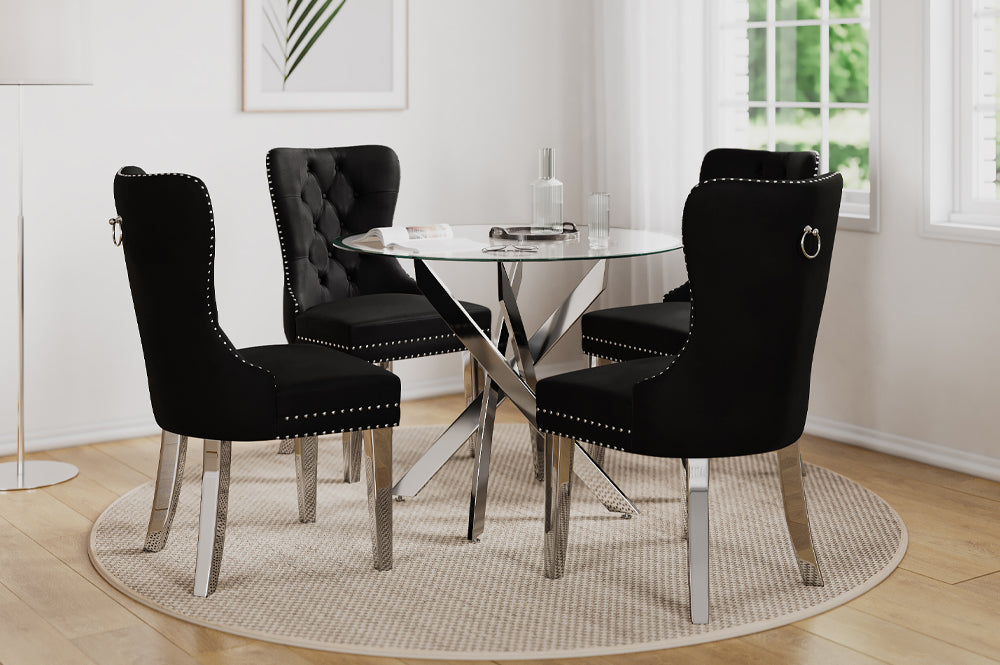 Full view of the 5-Piece Tempered Glass Dining Set, showing the clear glass table and four luxurious tufted chairs upholstered in velvet fabric.