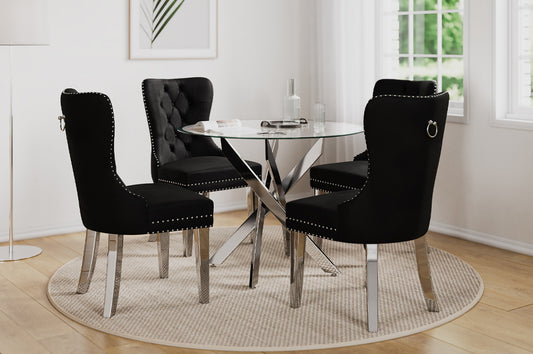 Full view of the 5-Piece Tempered Glass Dining Set, showing the clear glass table and four luxurious tufted chairs upholstered in velvet fabric.