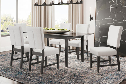 Full view of the 7-Piece Expandable Dining Set with the table extended and 6 modern chairs upholstered in cream or gray Boucle fabric.