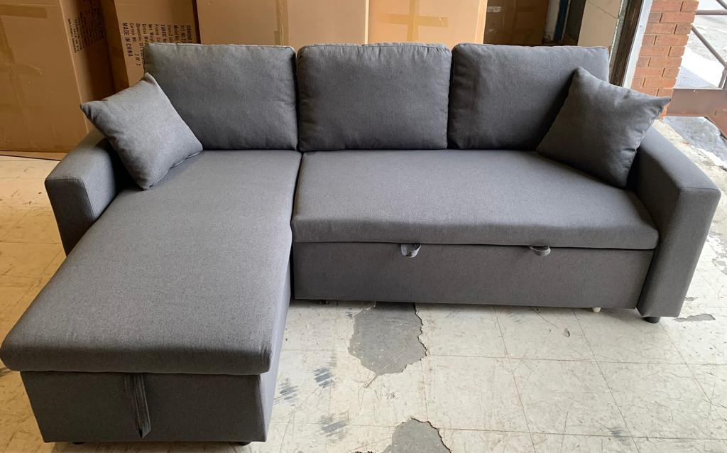 View of the Grey Fabric Sectional Sofa in its regular, closed position, highlighting the reversible chaise and compact 88-inch size.