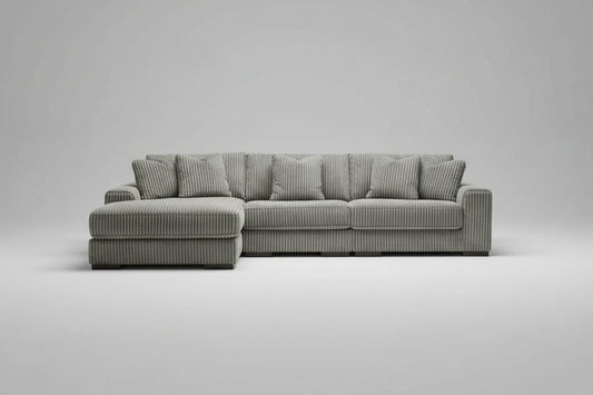 Full view of the Albany Grey Corduroy Sectional Sofa, showcasing the ribbed fabric, fixed Left-Hand Chaise, and the separation points of the 3-piece design.