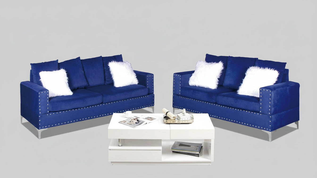 Full view of the Andy Blue Velvet 3-Piece Set, showcasing the vibrant blue color and luxurious texture of the sofa, loveseat, and chair.