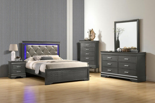 Full view of the Axora Black Bedroom Set, showcasing the platform storage bed with integrated LED lighting in the headboard, dresser, and mirror.
