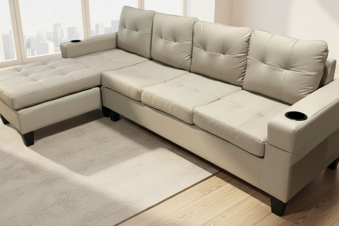 Full view of the Beige Gel Leather 4-Seater Sectional Sofa, showcasing the large L-shape design and neutral, light-colored upholstery.