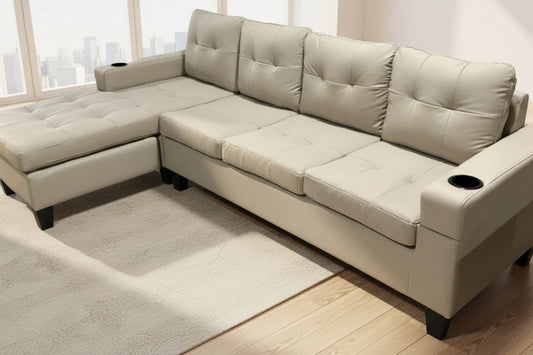 Full view of the Beige Gel Leather 4-Seater Sectional Sofa, showcasing the large L-shape design and neutral, light-colored upholstery.