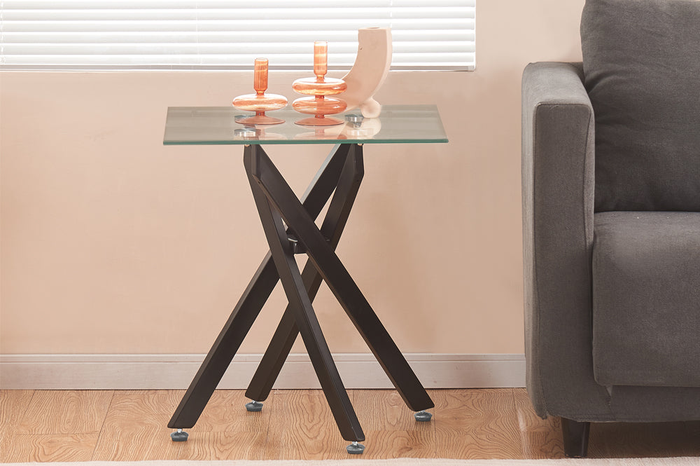 Close-up detail of the Coffee Table, emphasizing the refined edge finish of the Beveled Glass top and the architectural structure of the metal cross-hatch base.