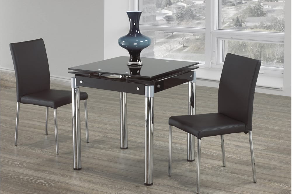 View of the Black Glass Dining Table fully extended, highlighting the smooth transition of the double leaves and the maximum seating capacity.