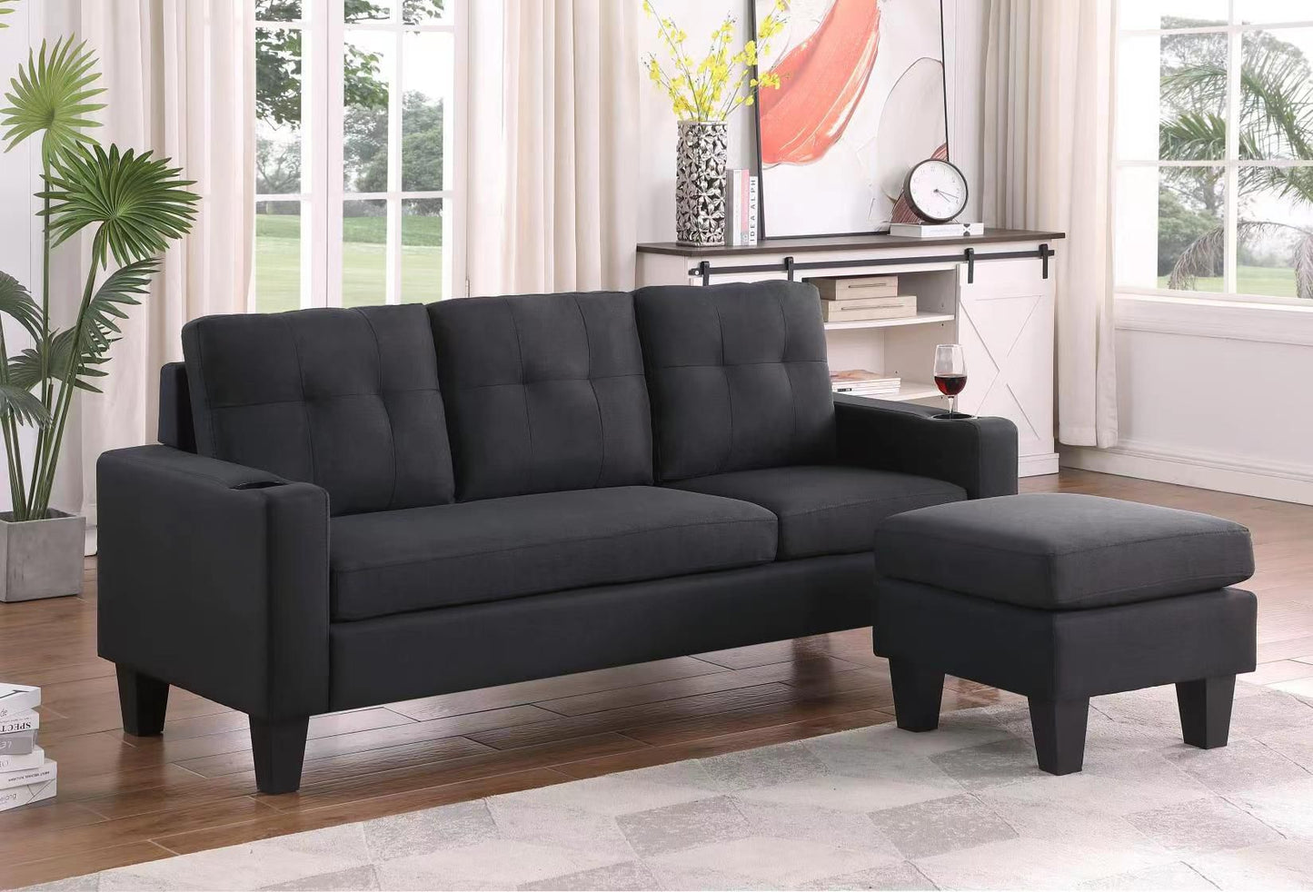 Angled view of the sectional highlighting the rich Black Linen fabric and the flexibility of the reversible chaise, demonstrating its easy modularity.