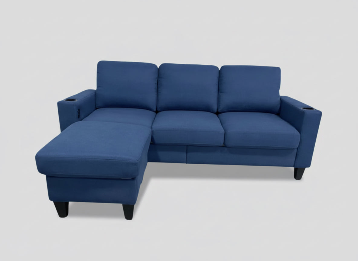 Full view of the Reversible Blue Microfiber Sectional Sofa, showing the soft upholstery, the L-shape configuration, and the center console with cupholders.