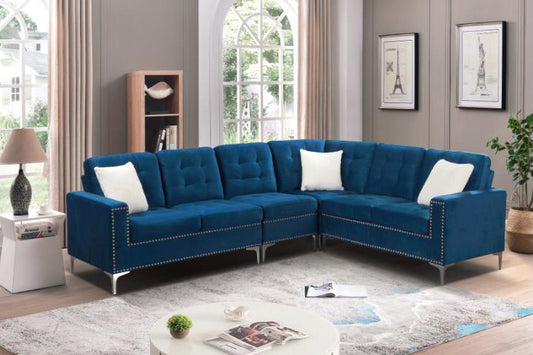 Full view of the Blue Velvet Fabric Sectional Sofa, showcasing the rich, plush upholstery, included accent pillows, and the sleek chrome legs.