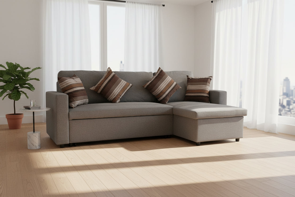 Full view of the BO Grey Fabric Reversible Sectional Sofa, showcasing its reversible chaise and the pull-out sleeper function ready for use.