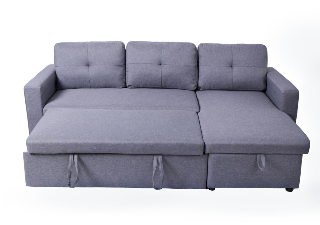 Close-up detail illustrating the smooth pull-out bed mechanism of the BO Grey sectional, emphasizing its ease of transformation.