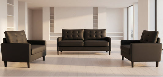 Full room view of the classic Black PU Leather 3-Piece Set, highlighting the sophisticated arrangement of the sofa, loveseat, and chair.