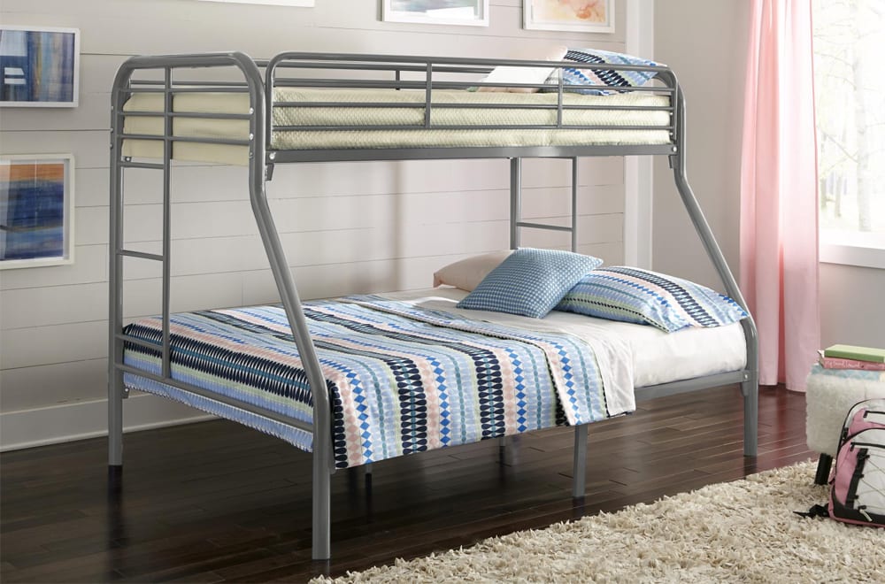 Contemporary steel single over double bunk bed in black finish, featuring a wide double lower bed and a twin upper bed with secure guardrails.