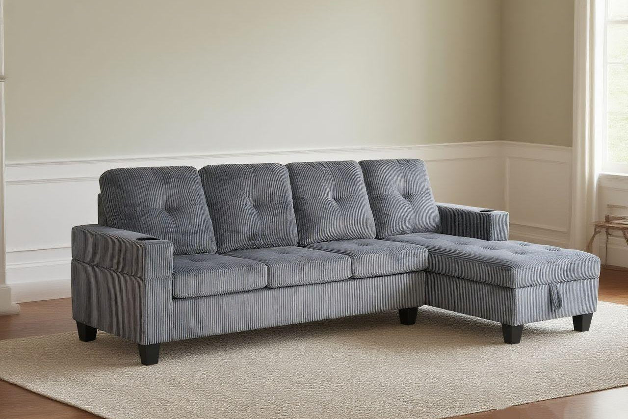 Full view of the 4-Seater Corduroy Sectional Sofa, showcasing the unique ribbed fabric and the console with cup holders, along with the reversible chaise.