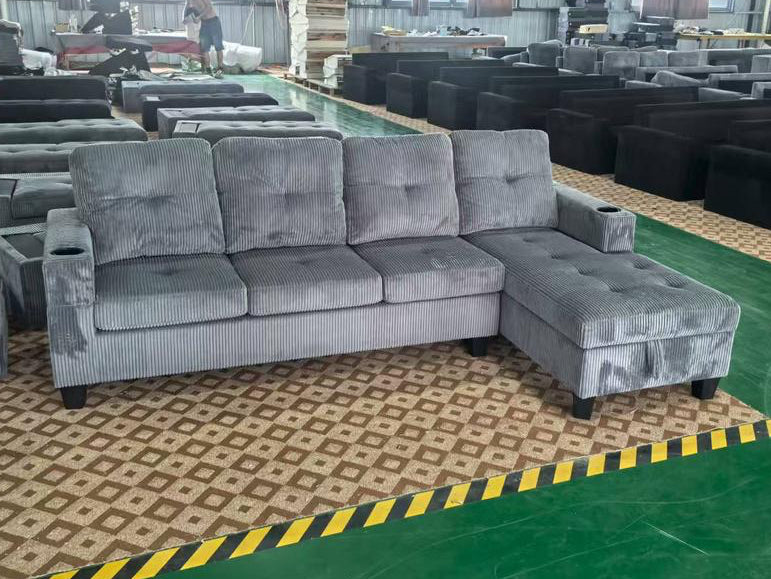 Close-up detail of the soft Corduroy fabric and the storage chaise cushion lifted, revealing the ample internal storage capacity.