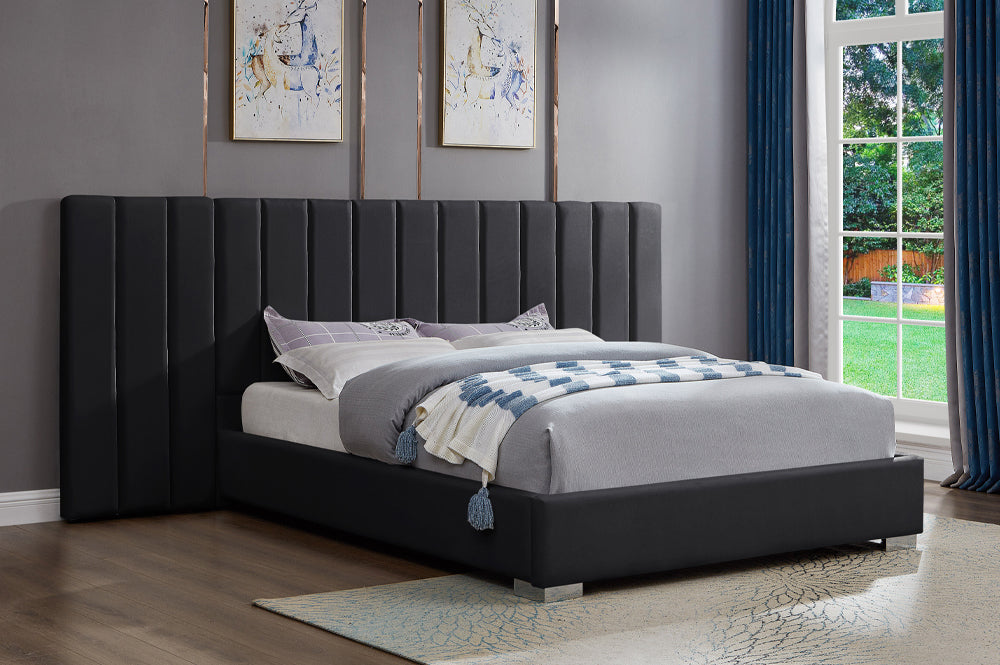 Elegant velvet upholstered panel platform bed with extended headboard in modern design
