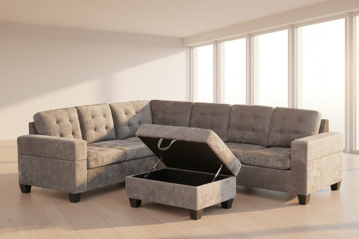 Full view of the Emerson Grey Velvet Reversible Sectional Sofa, showcasing the chic grey upholstery and the versatile matching ottoman placed next to the chaise.