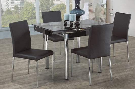Full view of the Extendable Black Glass Dining Table in its compact, unextended position, showcasing the sleek black top and polished chrome base.
