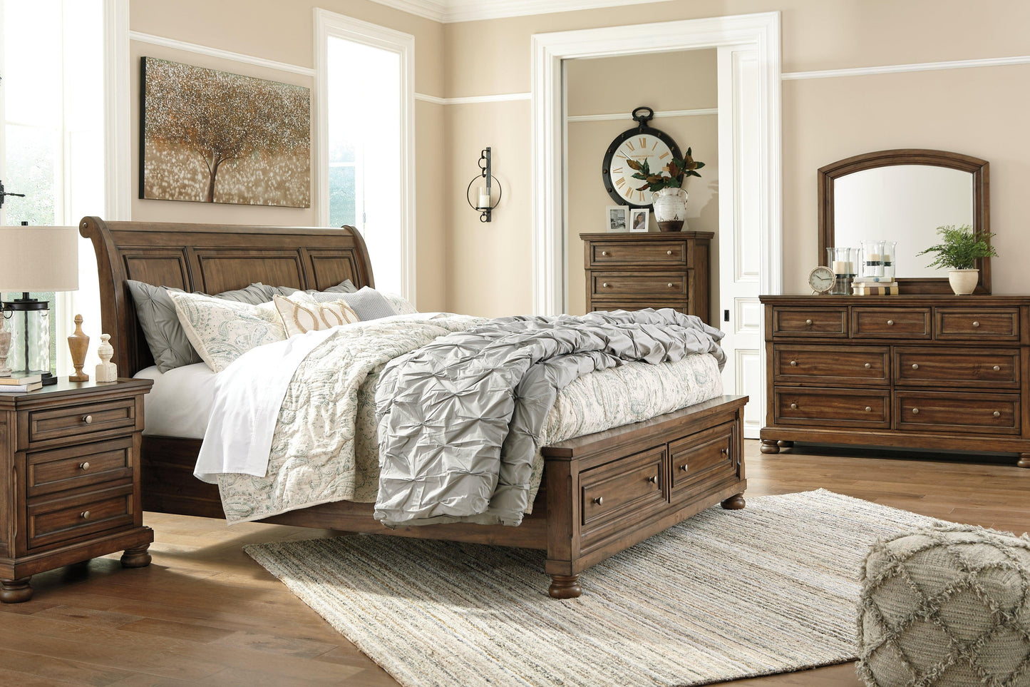 Full view of the Flynnter Sleigh Bed in Medium Brown, showcasing the curved headboard and footboard with two integrated storage drawers.