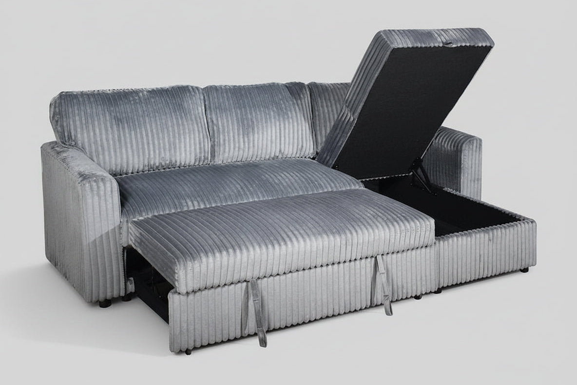Full view of the Grey Corduroy Reversible Sectional Sofa, showcasing the ribbed fabric texture, reversible chaise, and the pull-out sleeper extended.