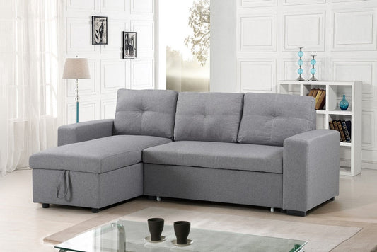 Full view of the Grey Fabric Reversible Sectional Sofa, showcasing the flexible chaise and the pull-out sleeper function extended.