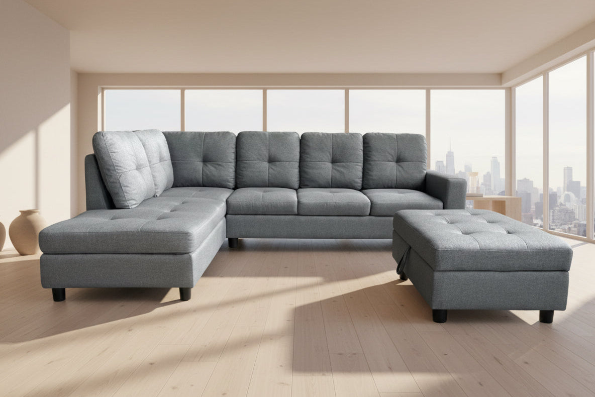 Full view of the Grey Linen Sectional Sofa, showcasing the textured fabric, the fixed Left-Facing Chaise, and the matching storage ottoman.