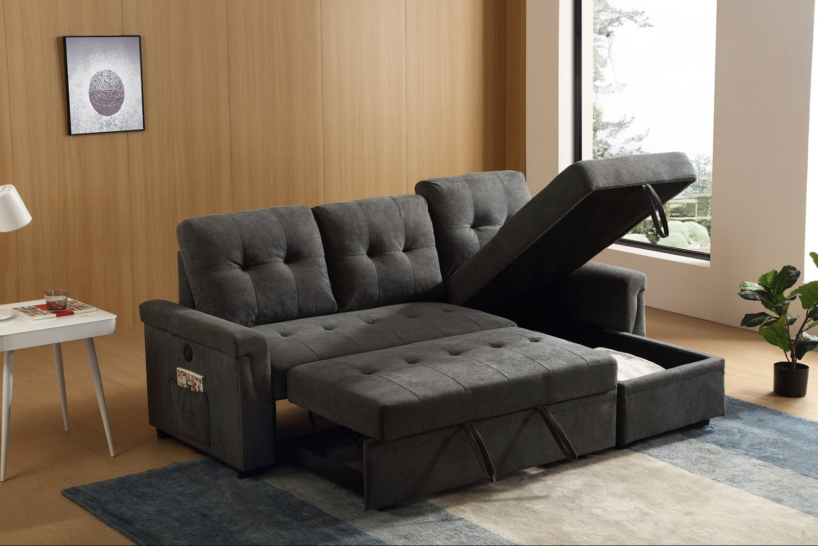 Full view of the Grey Fabric Reversible Sectional Sofa, showcasing the pull-out sleeper function extended and noting the integrated USB charging capability.