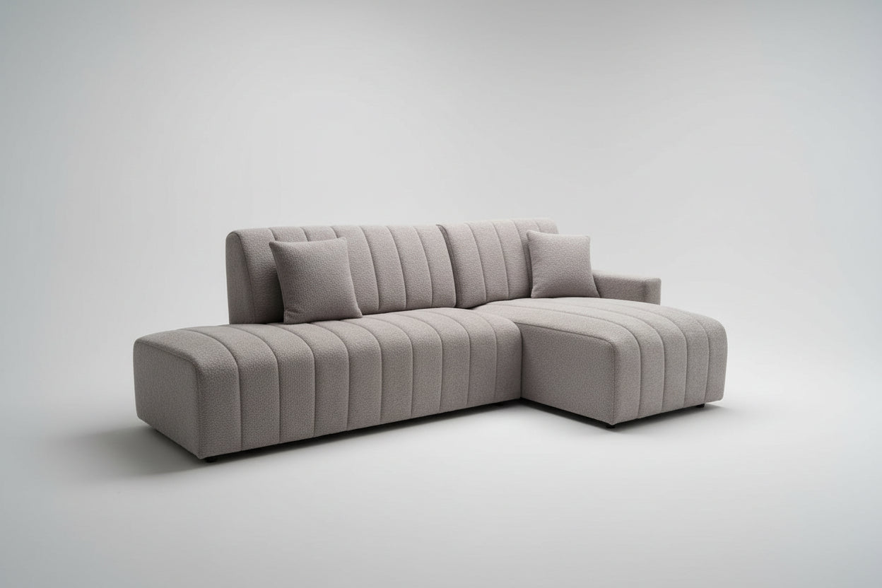Full view of the Grey Fabric Right-Facing Sectional Sofa with a built-in chaise lounge, arranged in a contemporary living space.