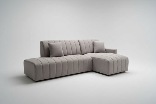 Full view of the Grey Fabric Right-Facing Sectional Sofa with a built-in chaise lounge, arranged in a contemporary living space.