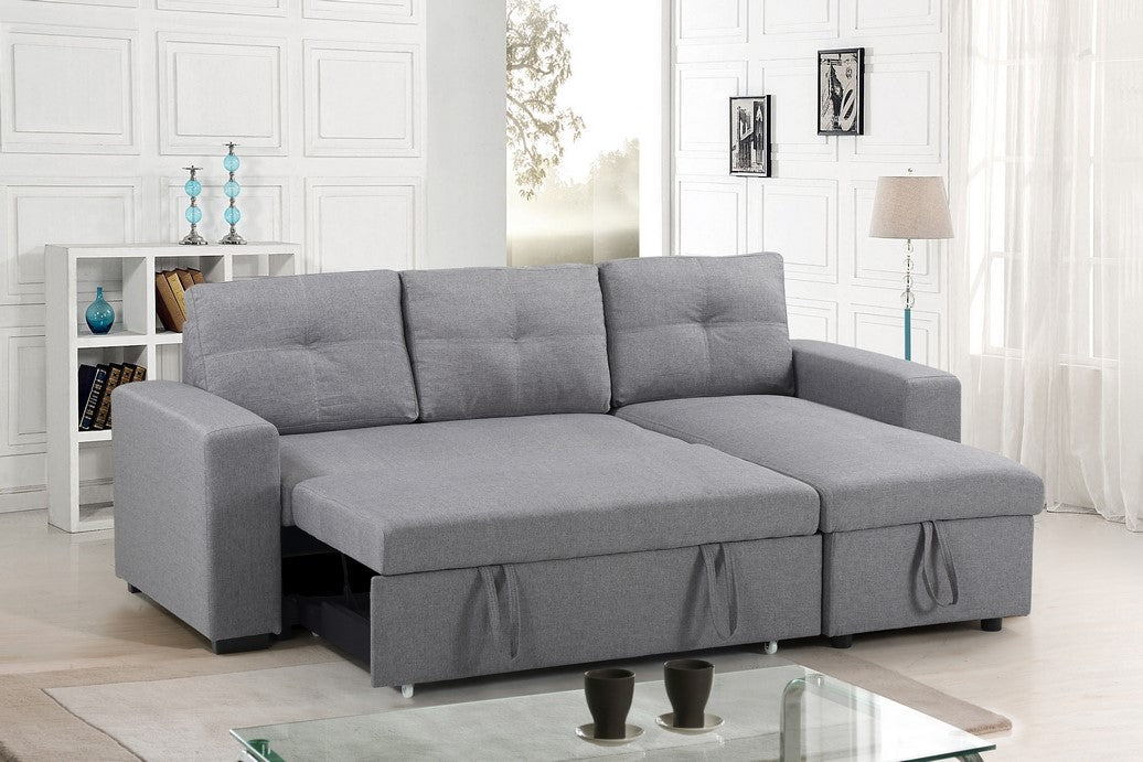 Angled view of the Grey Sectional Sofa in its standard seating configuration, highlighting the comfortable grey fabric and clean modern lines.