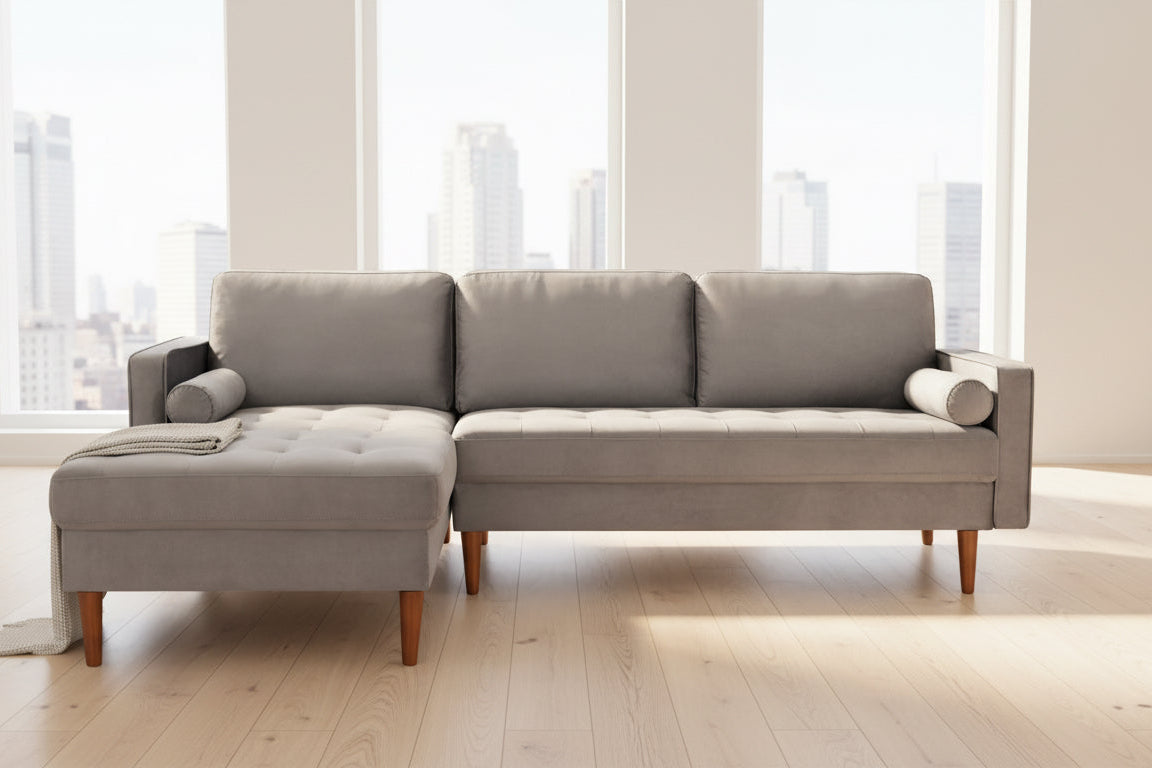 Full view of the Grey Velvet Sectional Sofa, showcasing the rich, plush fabric texture and the fixed Left-Hand Facing (LHF) chaise configuration.