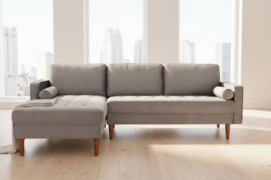 Full view of the Grey Velvet Sectional Sofa, showcasing the rich, plush fabric texture and the fixed Left-Hand Facing (LHF) chaise configuration.