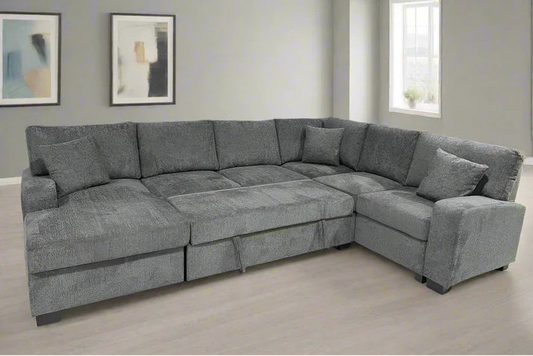Full view of the Harlow Dark Grey Sofa Bed Sectional with the sleeping mechanism fully extended, showcasing the comfortable full-size sleeper area.