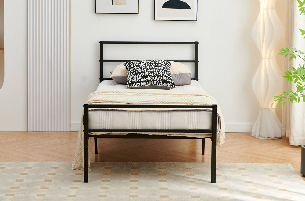 Black metal platform bed with slatted headboard and center support beam