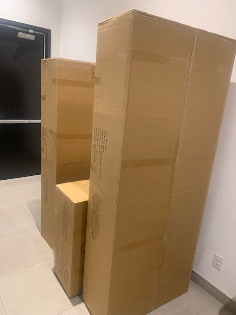 Close-up detail of the Ivy Blue Velvet fabric, highlighting the dual cup holders and the storage ottoman with its lid open for maximum capacity.